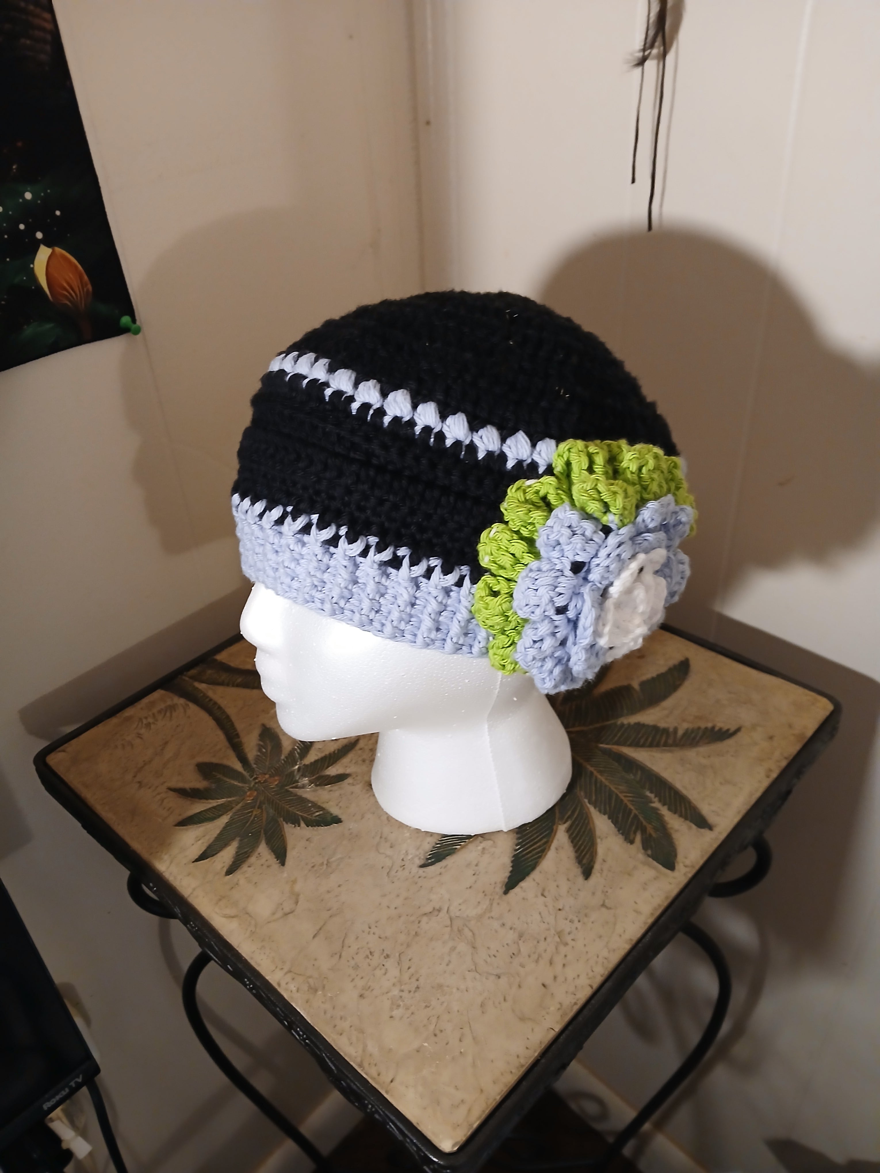 "Feeling cute today" light blue and black with crochet flower hat
