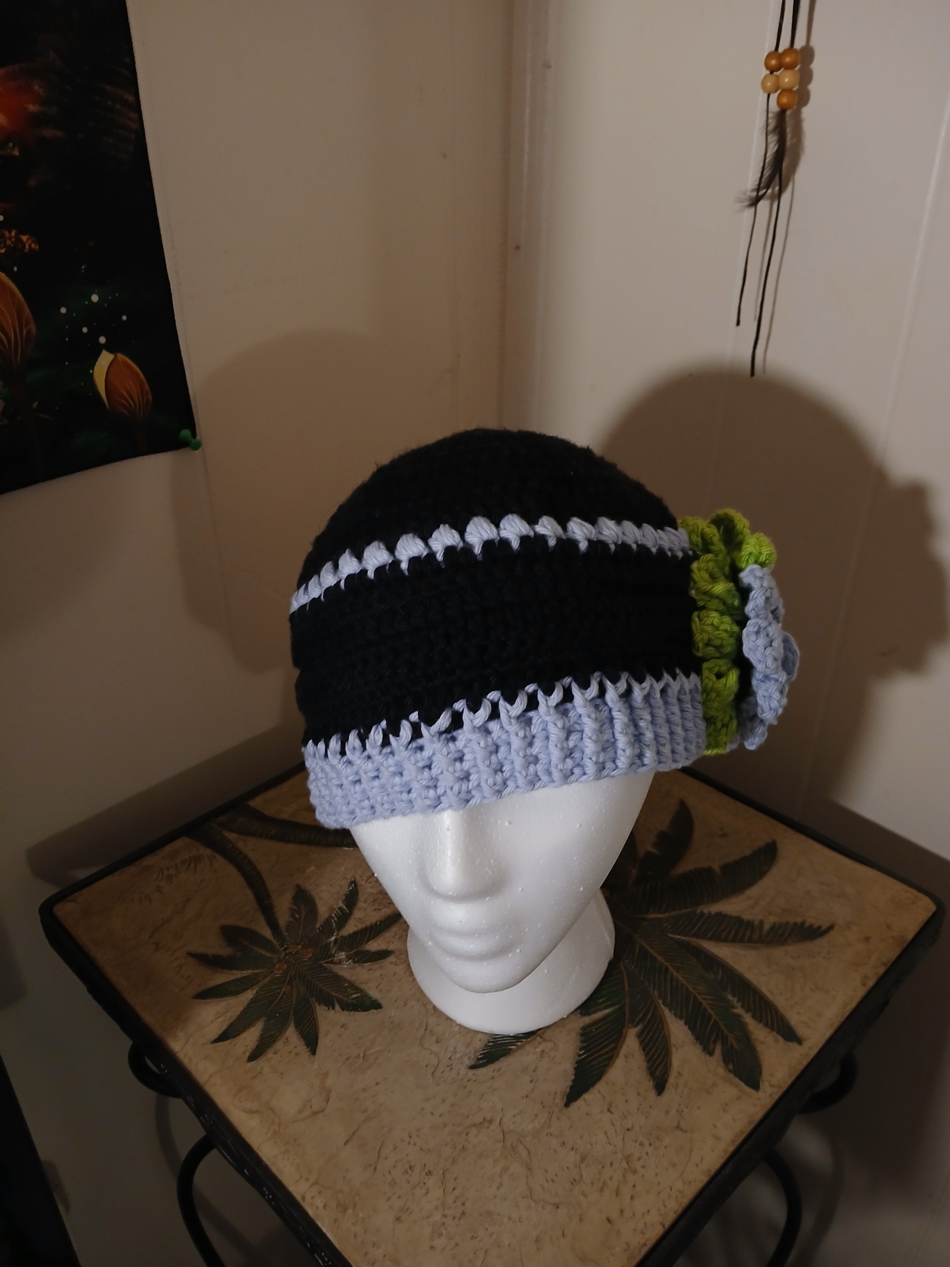 "Feeling cute today" light blue and black with crochet flower hat