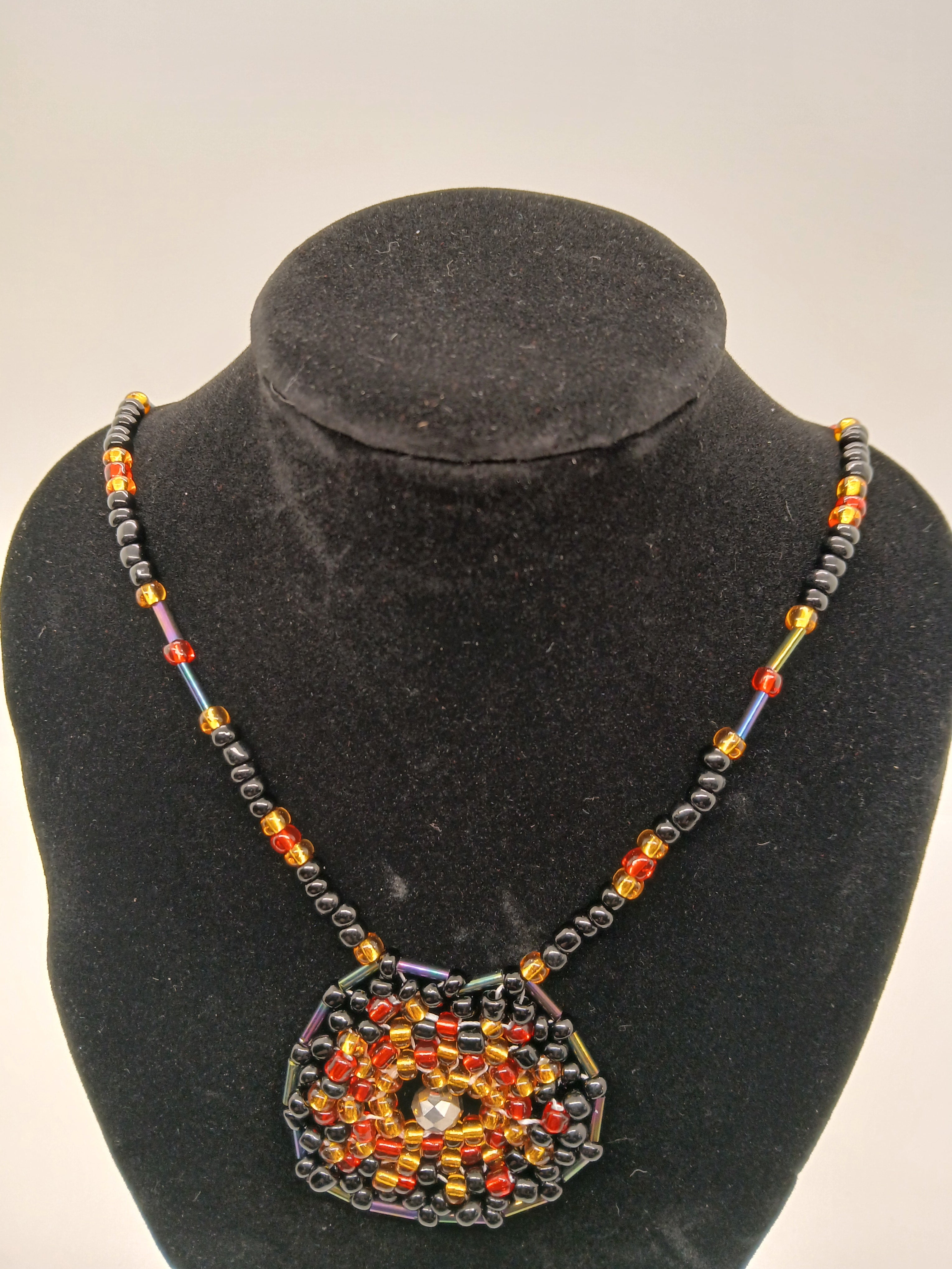 Ambers in the ash beaded pendant necklace by Oma Regina