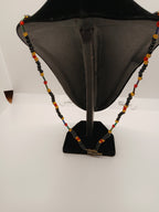 Ambers in the ash beaded pendant necklace by Oma Regina