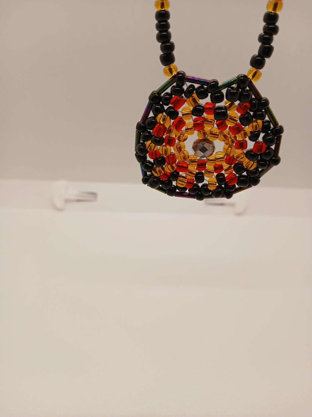 Ambers in the ash beaded pendant necklace by Oma Regina