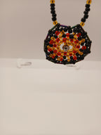 Ambers in the ash beaded pendant necklace by Oma Regina