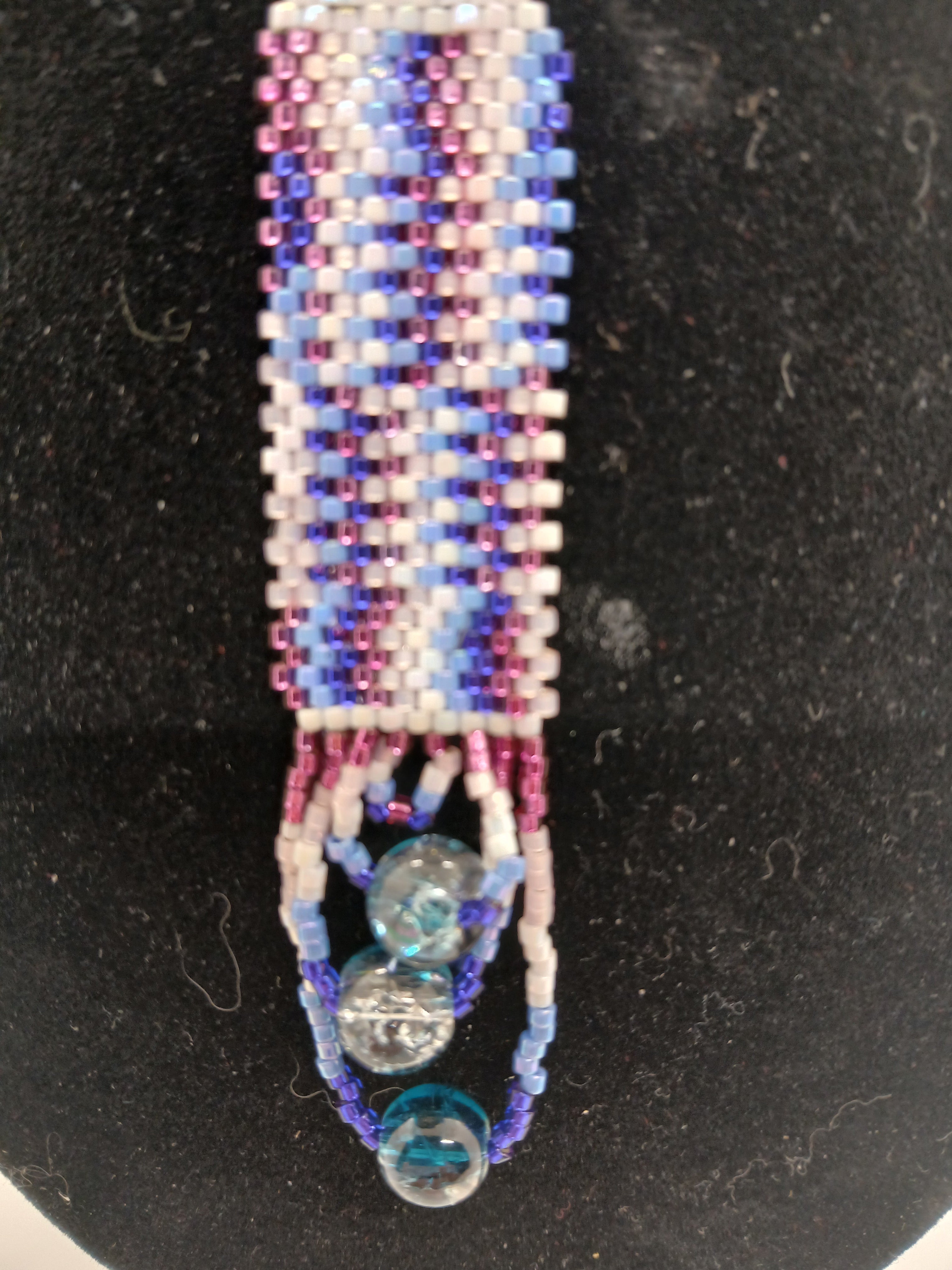 Set of two beaded pendants