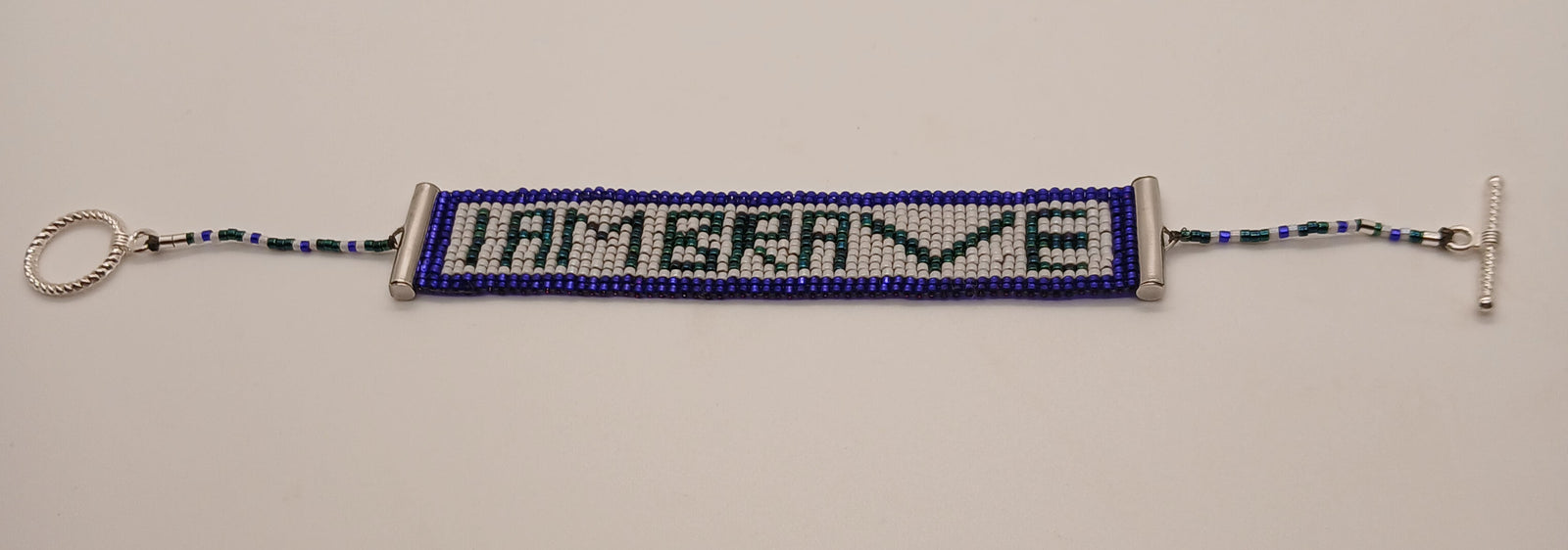 "I AM BRAVE" - hand-beaded, off-loom, self-affirming bracelet. Designed and bead woven by Artisan Regina L. Make this Bracelet part of your reclamation and self-affirmation ritual.Available for sale at:
https://owlhourcreativestudio.com/products/beaded-i-am-brave-affirmation-bracelet-for-lg-wrists?variant=51777792704814
