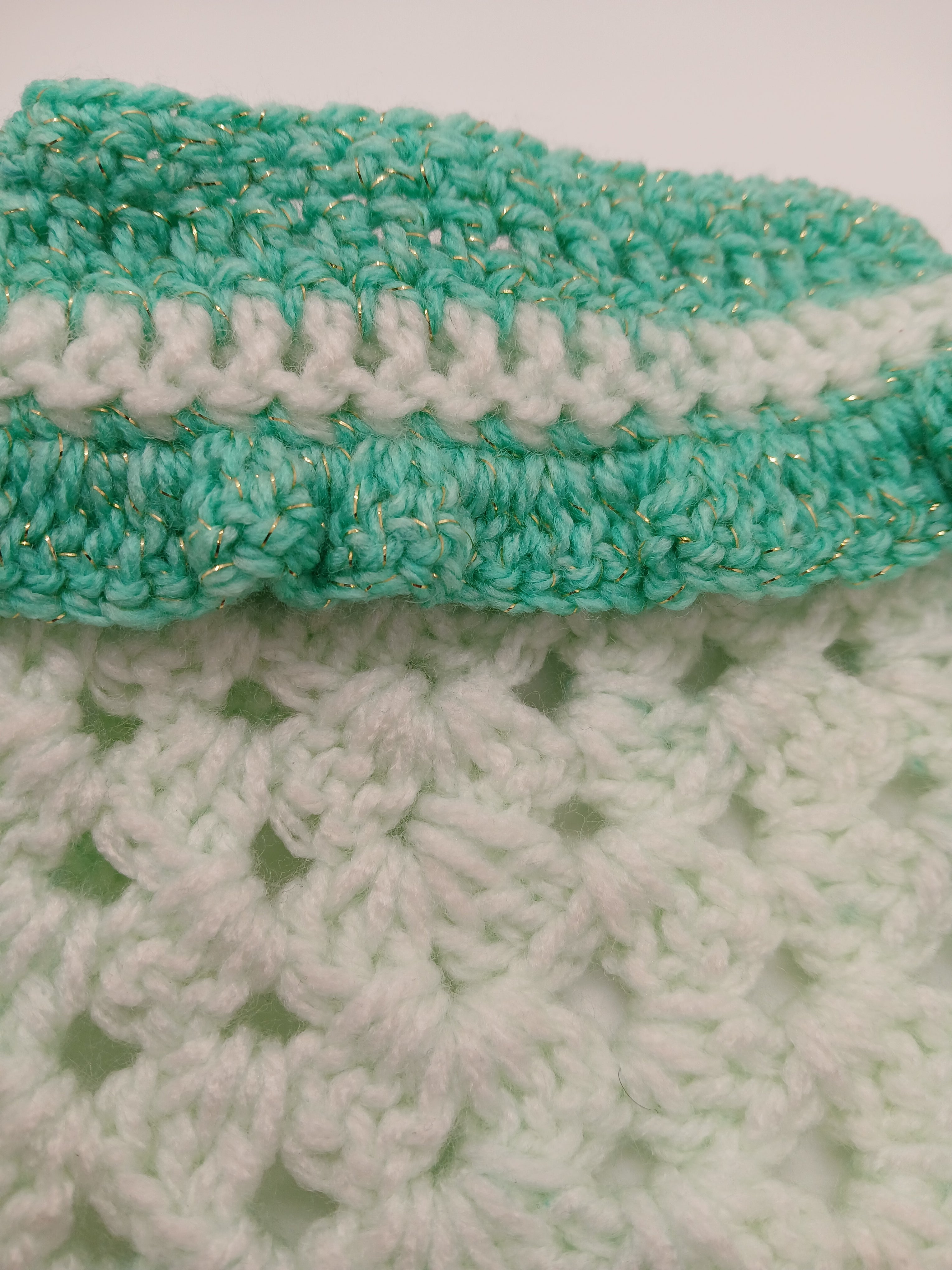 Adjustable crochet dog bandana with button closure in green hues