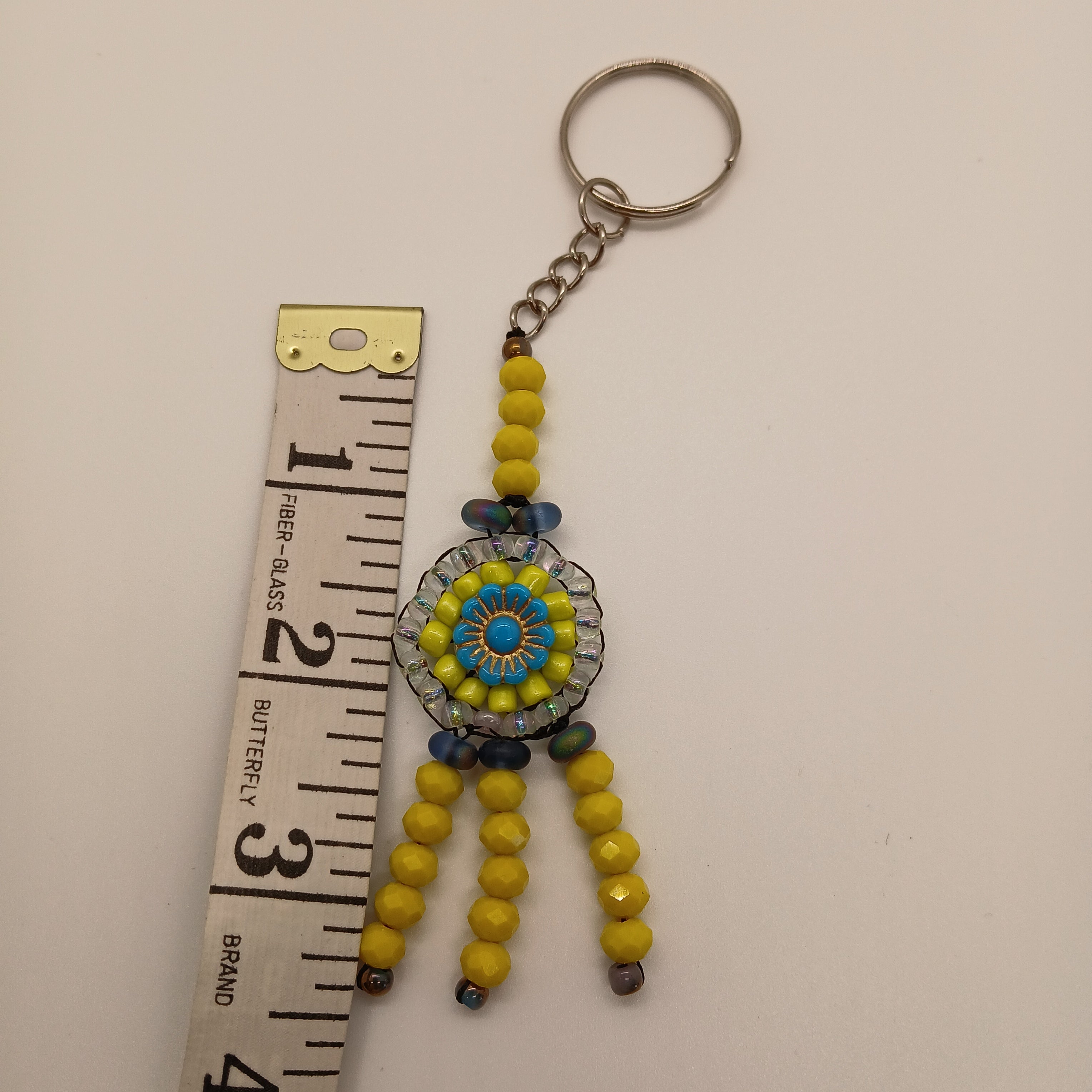 Hand-Beaded Sun Medallion Keychain – Yellow & Aqua Blue Bag Charm with Tassel Dangles – Artisan Crafted – Includes USA Shipping