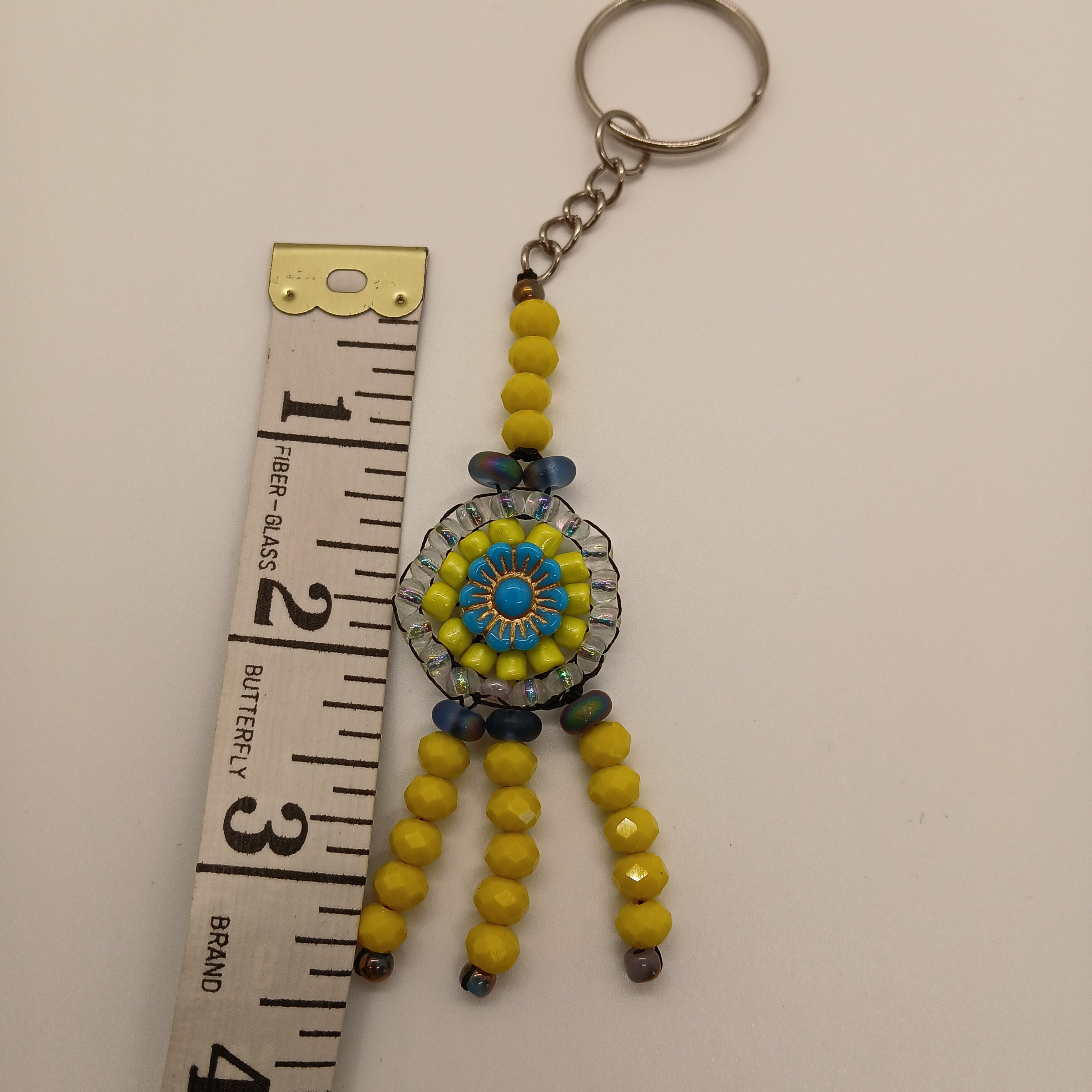 Hand-Beaded Sun Medallion Keychain – Yellow & Aqua Blue Bag Charm with Tassel Dangles – Artisan Crafted – Includes USA Shipping