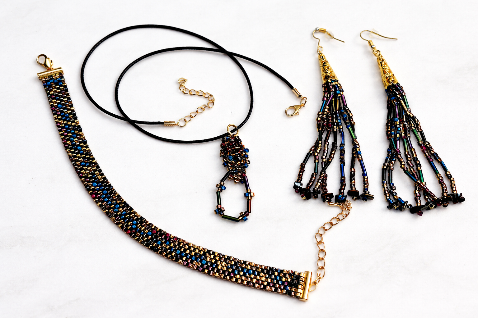 3 piece bead woven jewelry gift set for women. Handmade. One of a kind. Bracelet, Pendant with cord necklace, and dangle earrings. 
