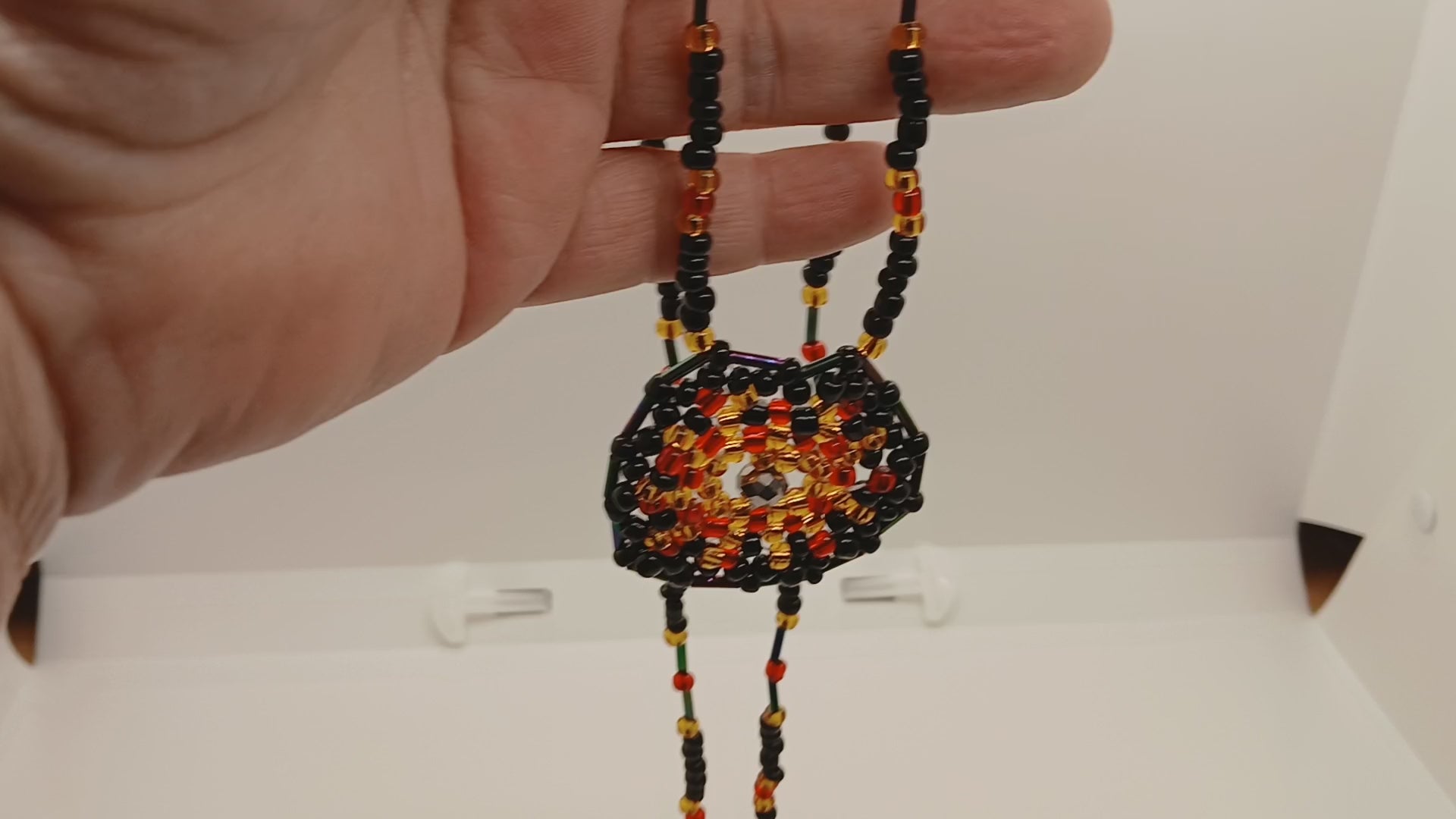 Ambers in the ash beaded pendant necklace by Oma Regina