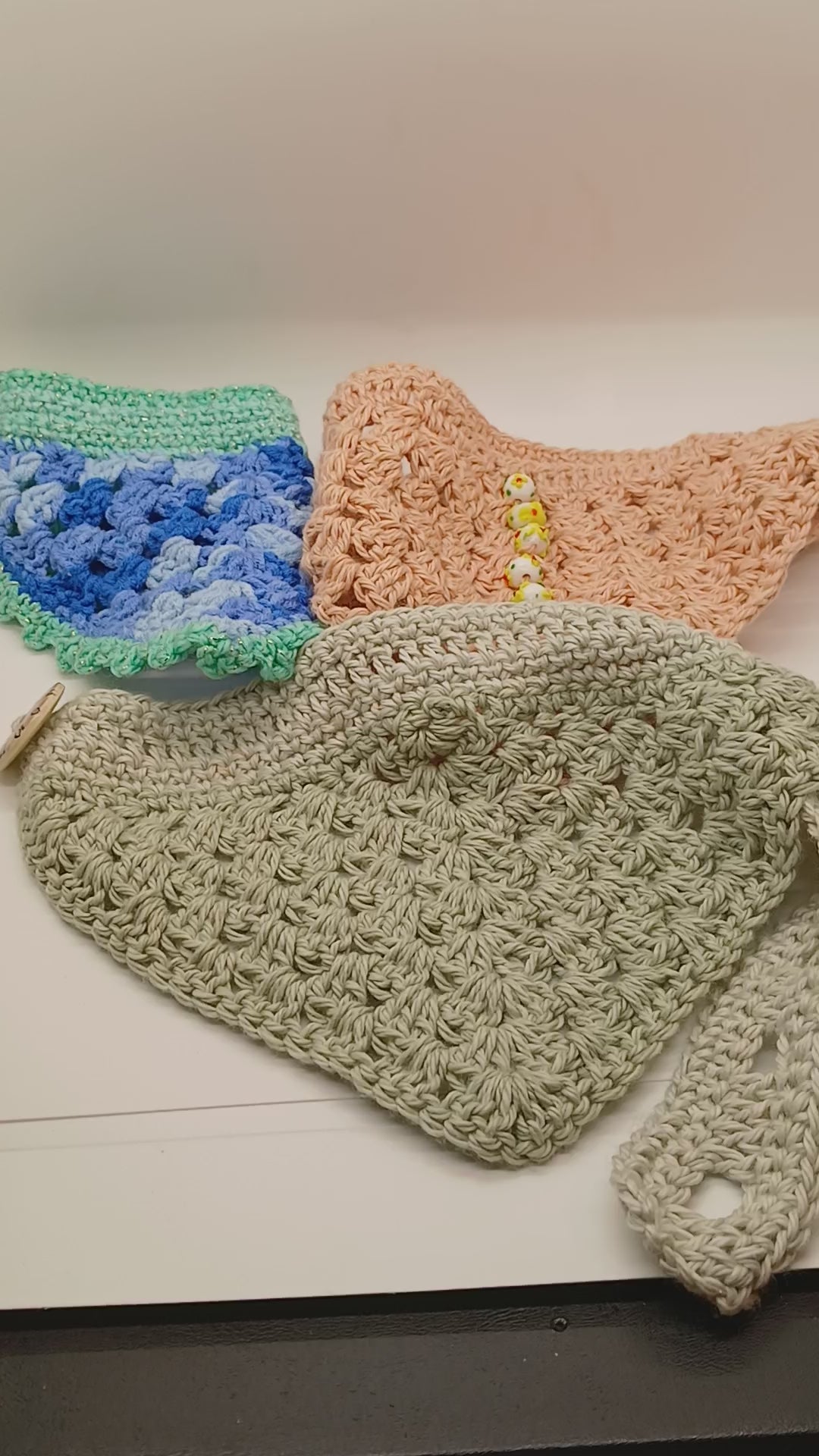 Three piece set of adjustable crochet dog bandanas for medium sized pups